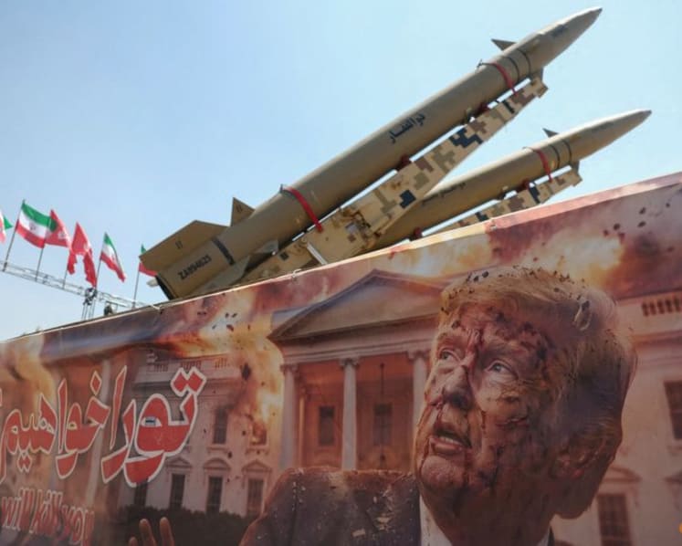 US forces strike two Iranian launchers on Iran's Larak island, US official says