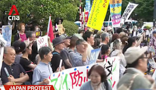 Japan protest: Demonstrators rally against shift away from country's post-war pacifist stance 