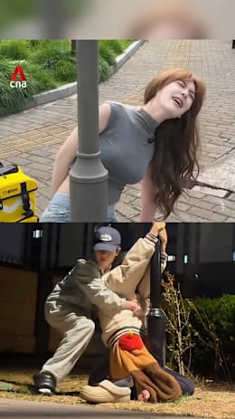 Viral lamp-post challenge in China sees people needing rescue