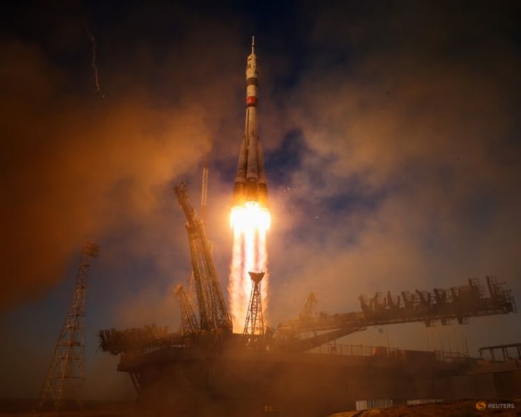 Russia sends American and two cosmonauts to space station with rare NASA chief visit