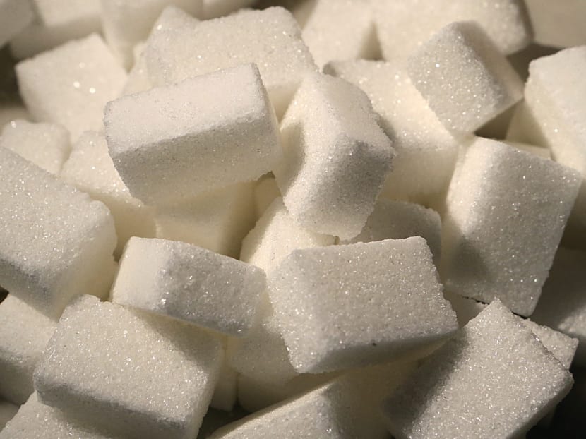 Major soft drinks producers said on Tuesday (Aug 22) that they have been cutting down their products’ sugar content over the years, and only a handful of products currently exceed the 12-per-cent sugar cap that the industry will commit to by 2020. Photo: AFP