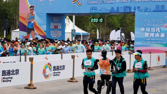 China pits humanoid robots against humans in half-marathon