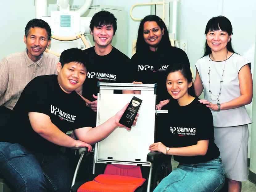 From left: NYP students Meng Xiong, Ren Jun, Kanageswari and Henrietta flanked by their lecturers Mr Kassim Bin Saat from the School of Engineering and Ms Tan Sai Geok from the School of Health Sciences. Photo: NYP