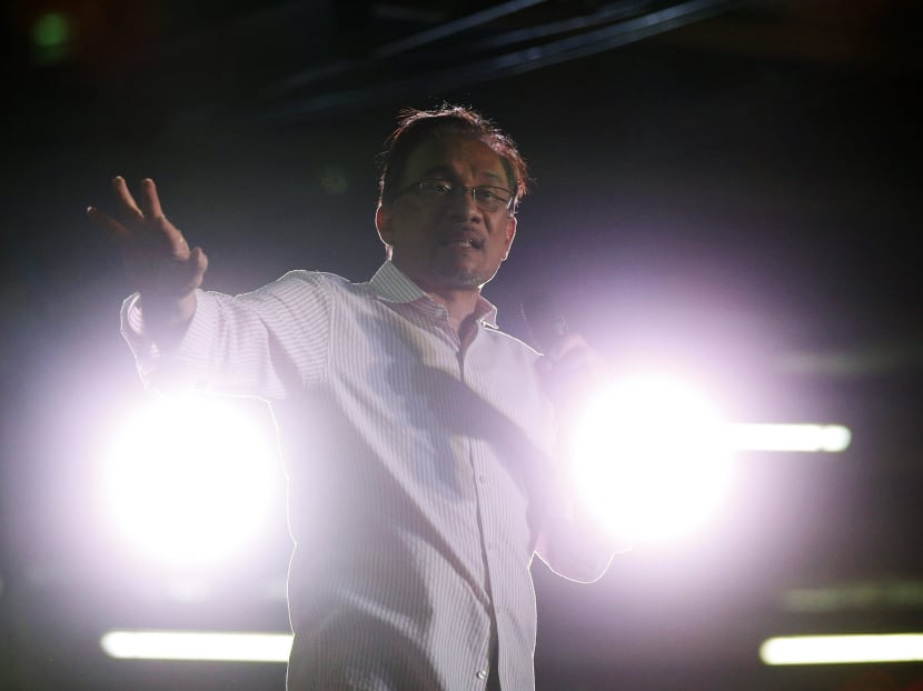 Malaysia's opposition leader Anwar Ibrahim speaks at a rally on the eve of the verdict in his final appeal against a conviction for sodomy in Kuala Lumpur. Photo: Reuters
