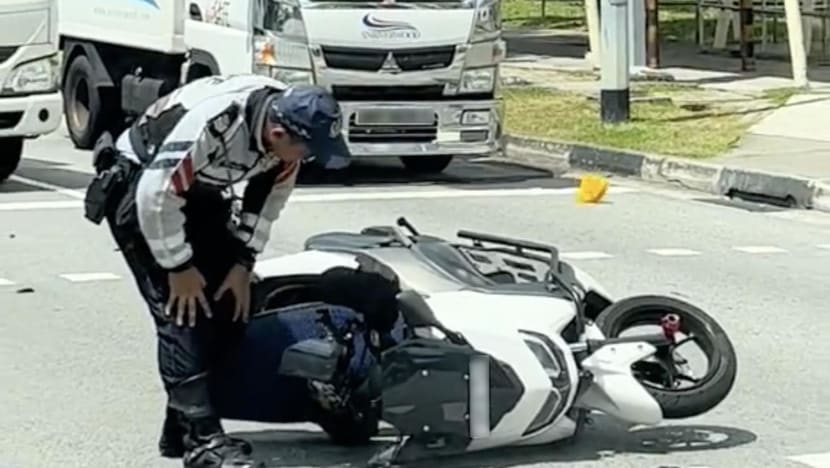 Food delivery motorcyclist, 52, taken conscious to hospital after accident with lorry in Sembawang