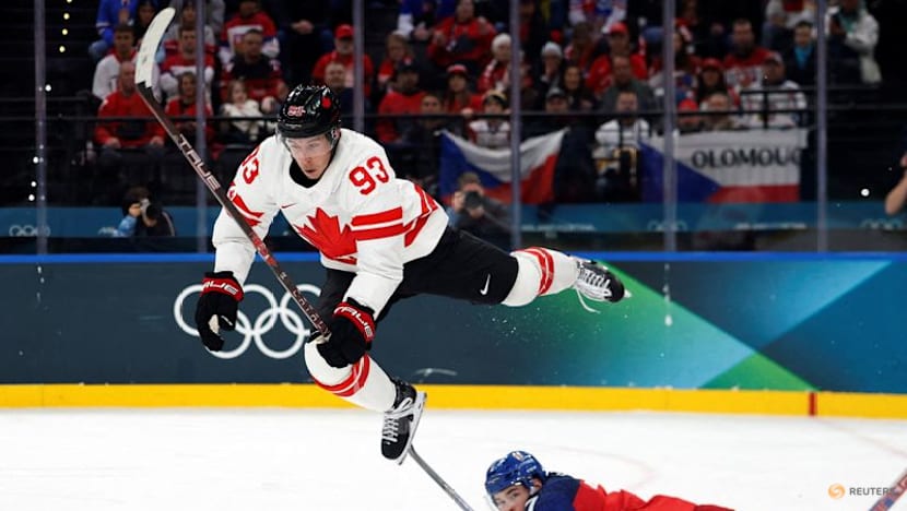 Ice hockey-Canada blank Czechs, US overpower Latvia, wins for Swiss and Germany