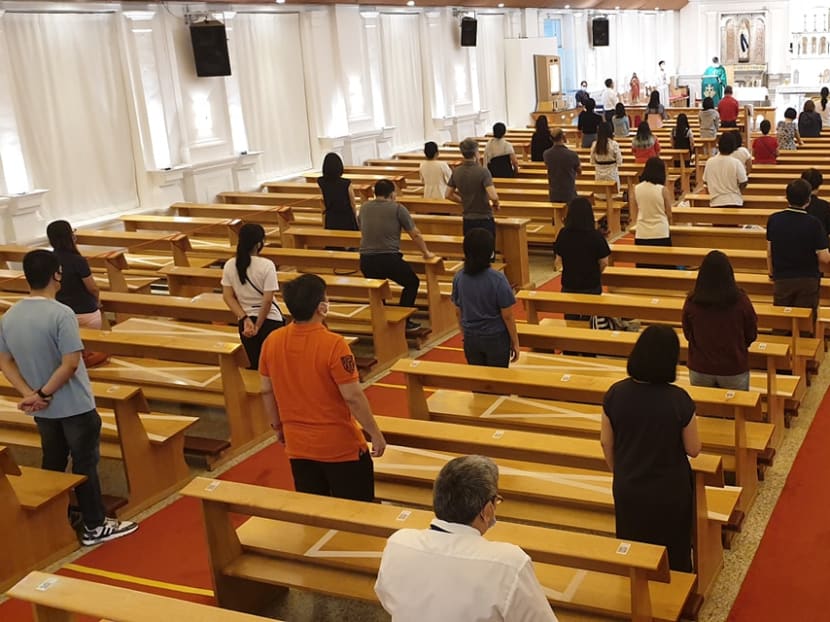 Catholics attending weekend Mass at the Church of the Sacred Heart along Tank Road.