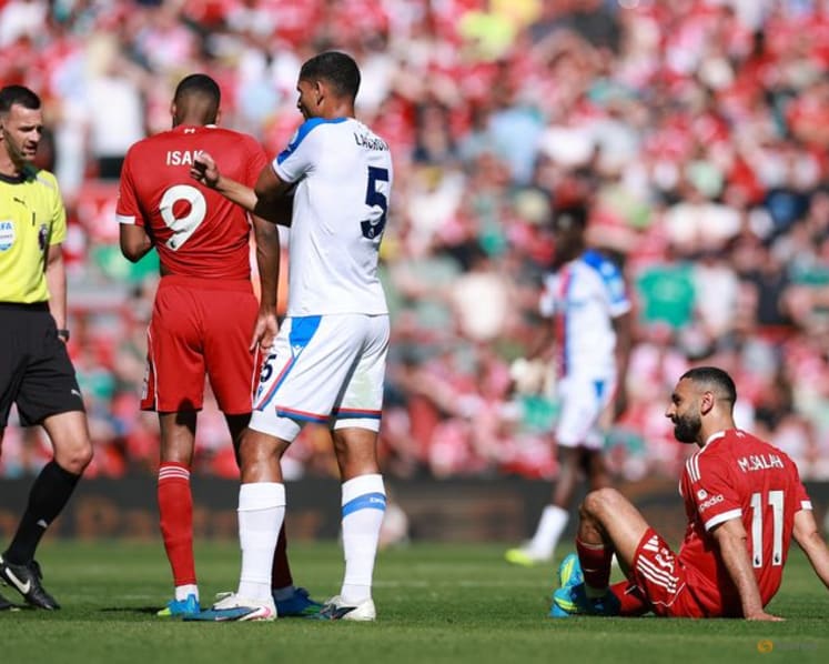 Liverpool edge closer to Champions League but Salah injury clouds Palace win