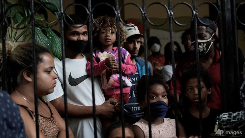 Brazil’s poor squeezed by less virus aid, surging food costs