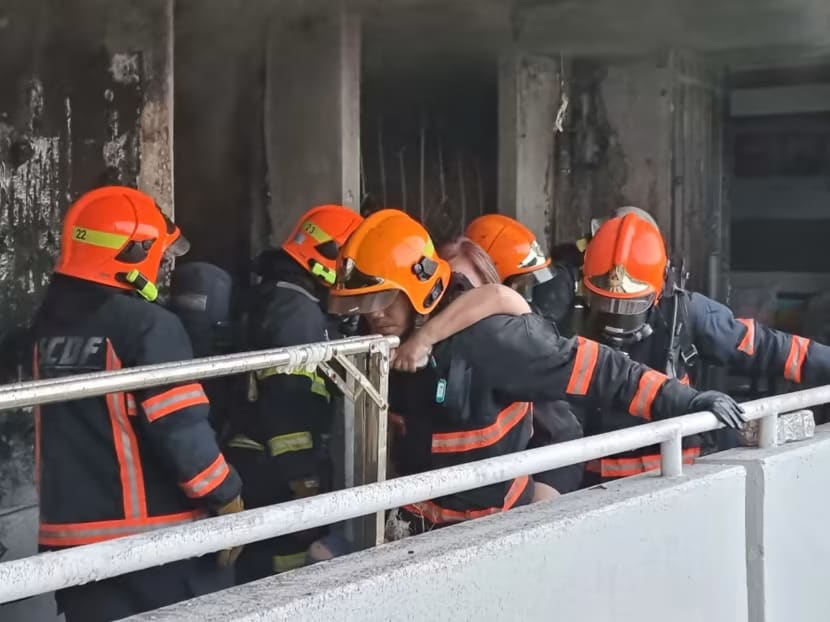 SCDF officers during the firefighting operation at Block 409 Bedok North Avenue 2 on May 13, 2022.