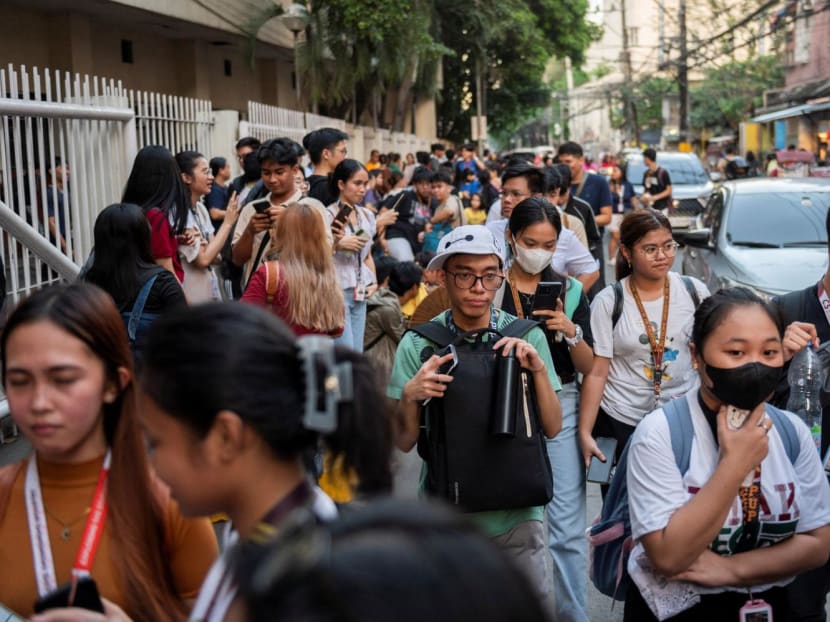 Students evacuate following an earthquake, in Manila, Philippines on Dec 5, 2023. 