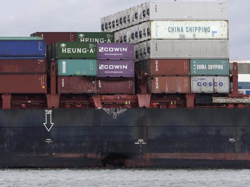 The APL DENVER, anchored at Pasir Gudang Port. Damage to the hull can be seen just at the waterline. Photo: Wee Teck Hian/TODAY The APL DENVER, anchored at Pasir Gudang Port. Damage to the hull can be seen just at the waterline. Photo: Wee Teck Hian/TODAY