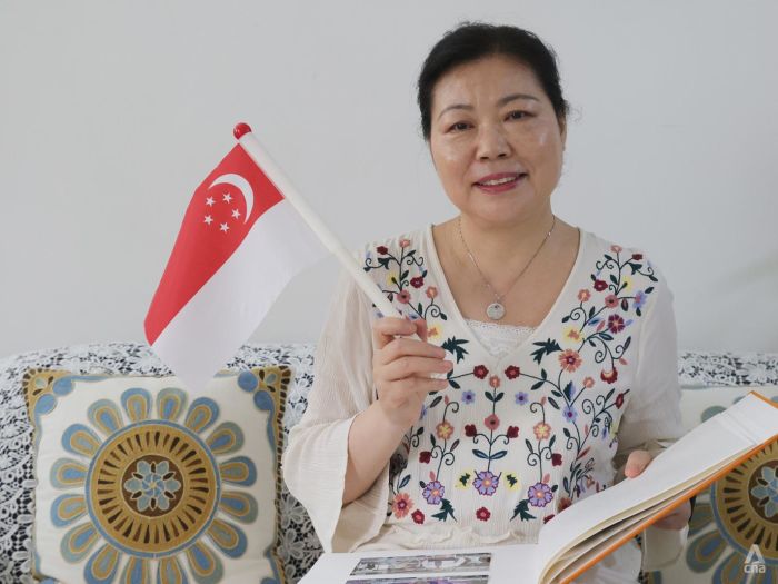 A career boost, a better life – she left family in China to work in Singapore, a nation her dad admired