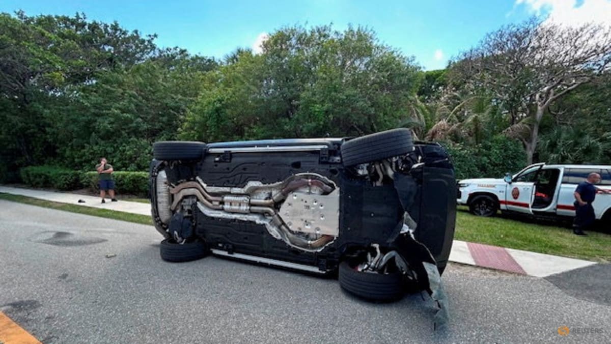 Woods told police he was looking at phone before rollover crash