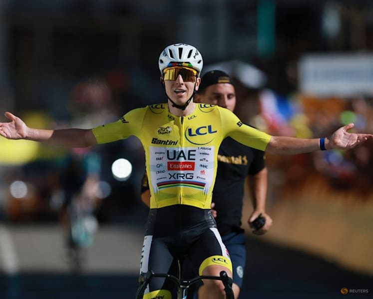 Brilliant Pogacar climbs Alpe d'Huez in record time to win Tour stage 19