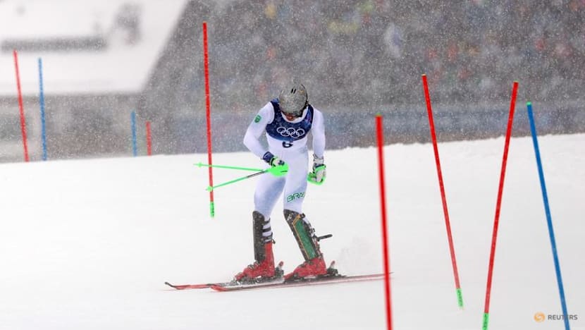 Alpine skiing-Norway's McGrath leads crash-strewn men's slalom, Pinheiro Braathen exits