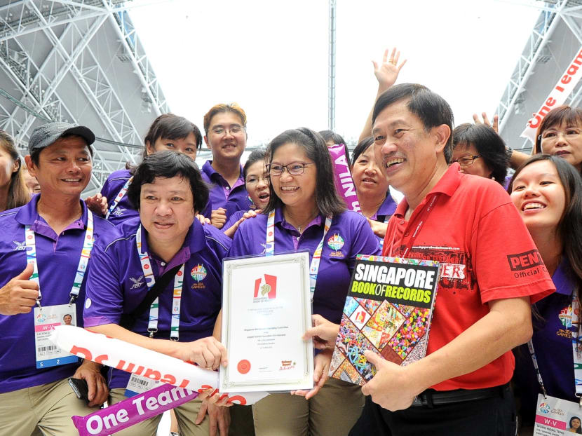 SEA Games volunteers break S'pore record for 'Largest Human Formation of a Numerical'