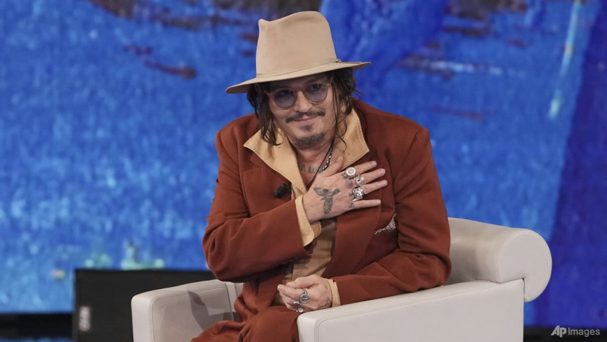 Actor Johnny Depp warns fans of scammers' impersonating him