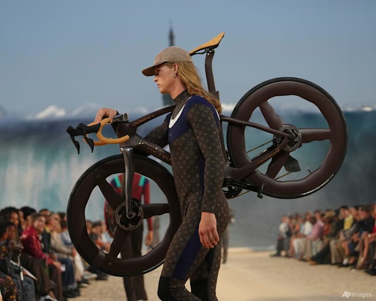 Louis Vuitton’s surfer dandy rides a giant wave at Pharrell Williams’ Paris Fashion Week show