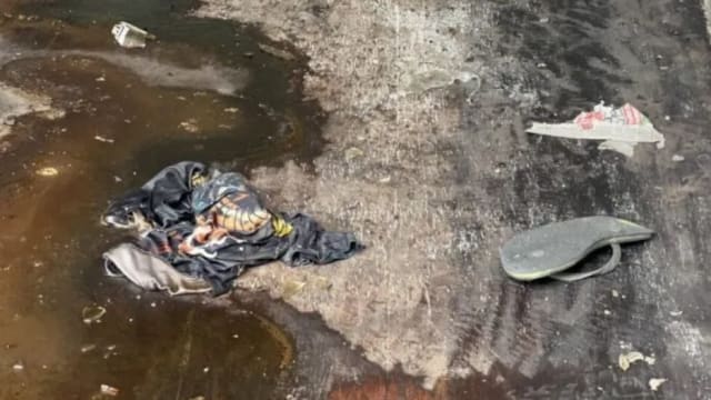 泰国一集装箱内发现两具尸体 女死者或已怀孕 
