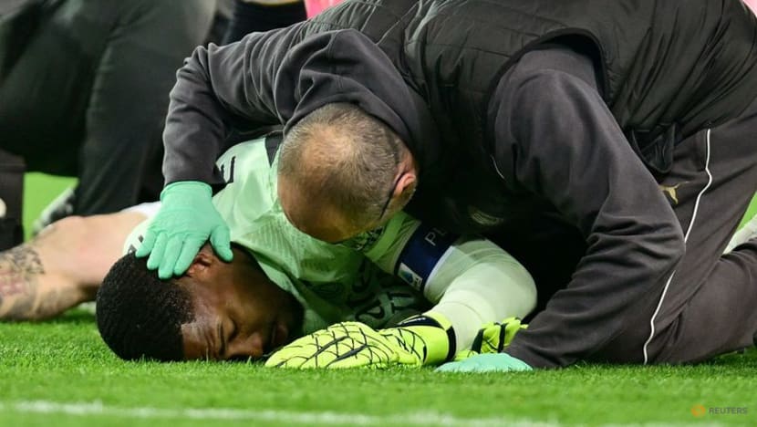 Injured Maignan to return to Milan after overnight hospital stay