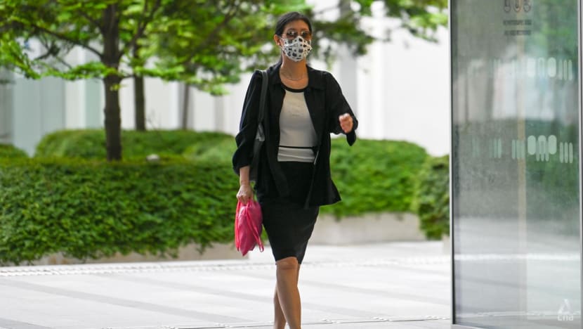 Katong road rage incident: Woman who drove with cyclist on bonnet fails in appeal against disqualification Katong road rage incident: Woman who drove with cyclist on bonnet fails in appeal against disqualification