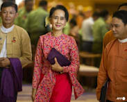 Myanmar cuts ex-leader Aung San Suu Kyi's sentence, frees former president