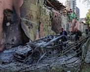 Russia pounds Kyiv with missiles, killing at least nine