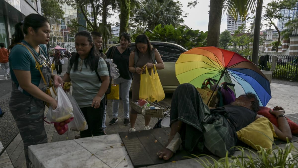 Far From Home: Migrant workers in Malaysia make their mark by giving back to society, helping fellow countrymen