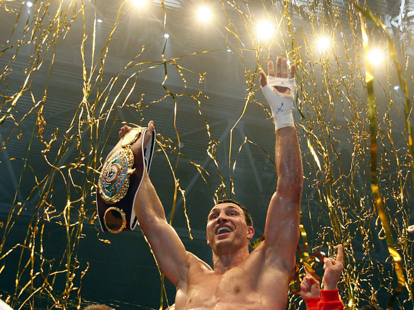 IBF, WBO and IBO boxing champion Wladimir Klitschko celebrating after his IBF, WBO and IBO title heavy weight boxing fight against US boxer Eddie Chambers  in Duesseldorf, Germany, in 2010. The Ukrainian was a dominant force but never quite got his due recognition because his fighting style was dull. Photo: AP