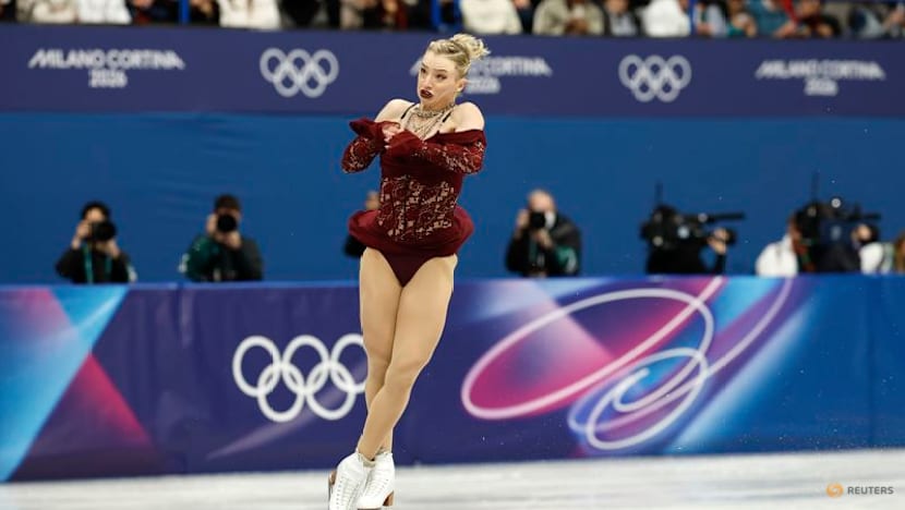 Figure skating-Liu shines while Glenn suffers heartbreak in Milan