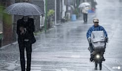 Tropical storm Jangmi batters Japan, cuts power to 60,000 homes