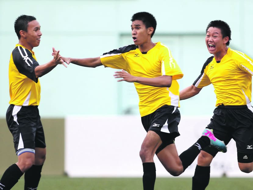 Muhammad Deferdauz (centre) celebrating his brace for VJC. Photo: Wee Teck Hian