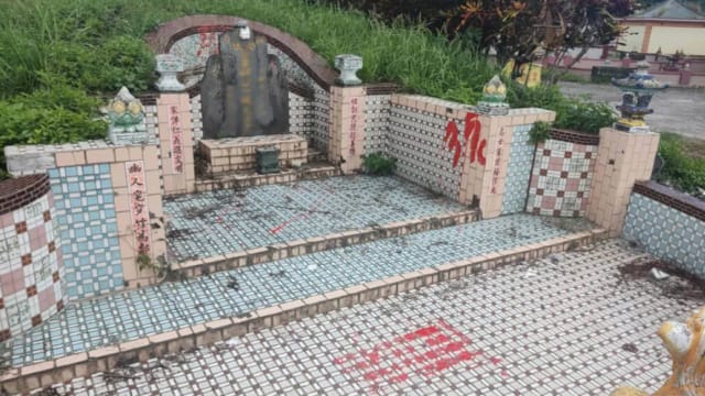 买法拍地附坟墓 台新地主喷漆逼家属迁坟