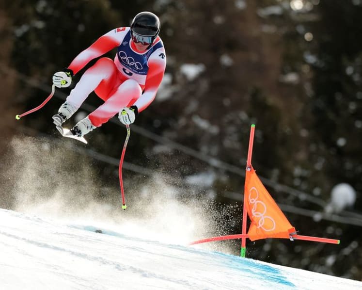 Alpine skiing-Switzerland's Von Allmen wins downhill gold