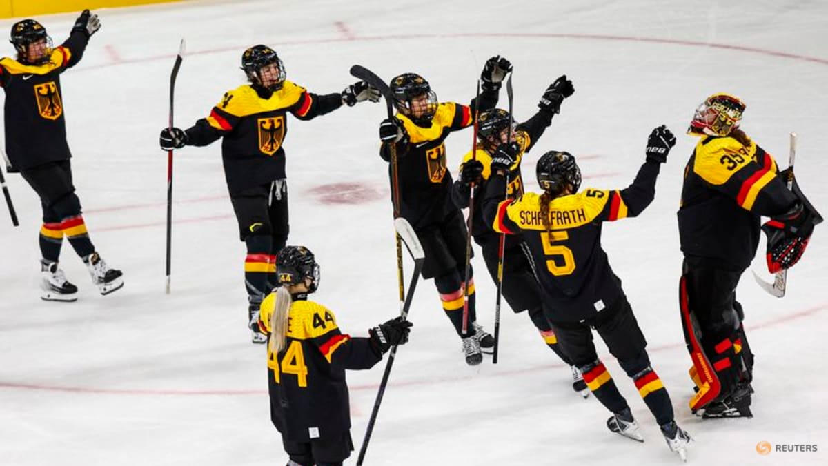 Ice hockey-Germany beat Japan, Canada to begin women's title defence