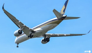 Man charged with molesting air stewardess on Singapore Airlines flight