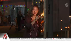 A glow of tradition: Malaysian village lights up 'pelita panjut' lamps for Hari Raya