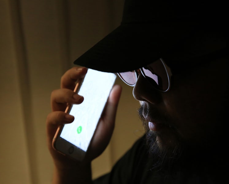 Three arrested for suspected involvement in DHL phone scam
