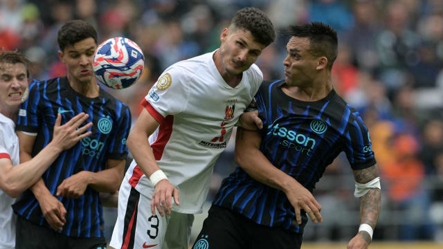 足球俱乐部世界杯：国际米兰以2比1战胜浦和红钻