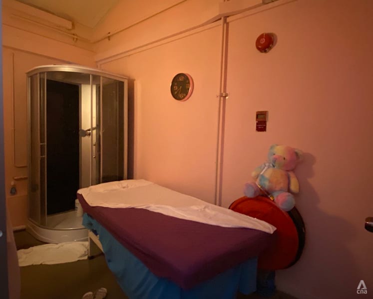Illegal massage parlours and illegal gambling in Singapore: Inside a police raid