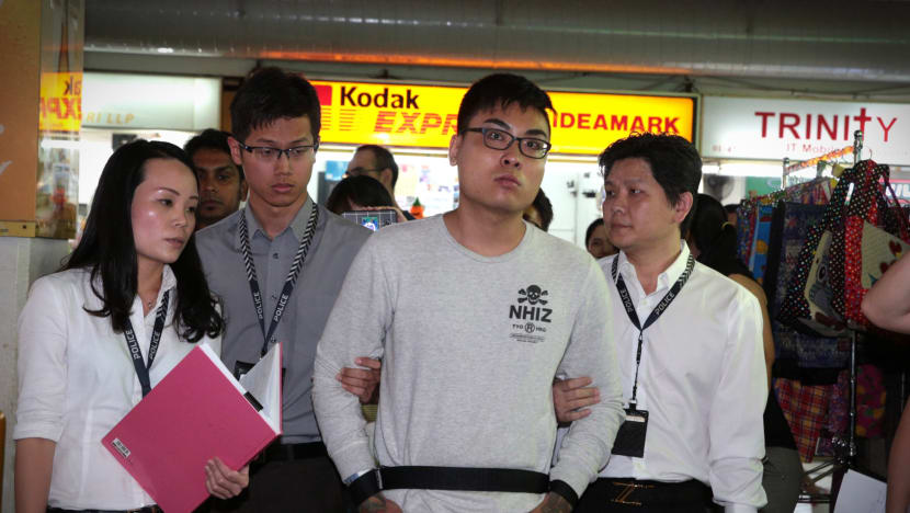 Suspect for Golden Mile Complex assault brought to scene for reenactment