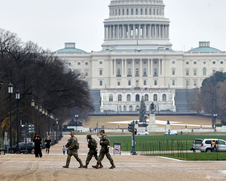 Trump administration to carry out sweeping immigration review after National Guard shooting