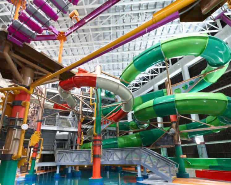 HomeTeamNS opens new clubhouse at Bedok Reservoir, featuring Singapore’s longest indoor water slide