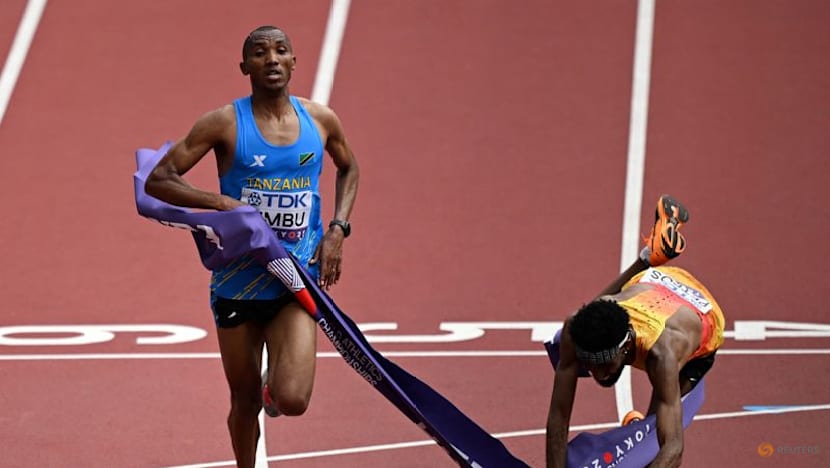 Simbu snatches marathon gold from Petros in historic photo finish