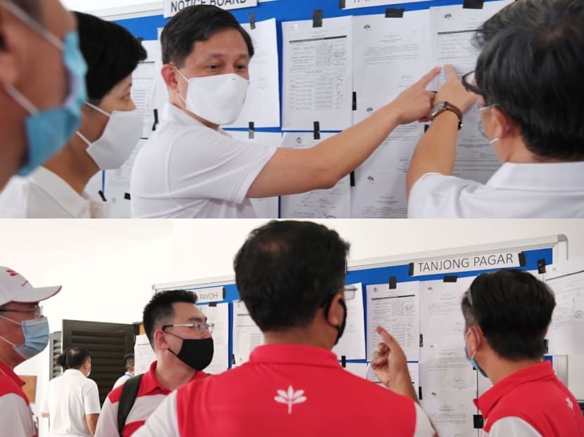 Candidates from PAP and PSP checking the nomination papers.