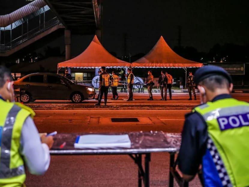Police officers in Malaysia help man affected by movement control order by giving him baby formula for newborn