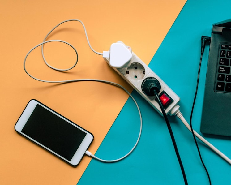 Your hand feels tingly while using a charging phone? What causes it and is it still safe?