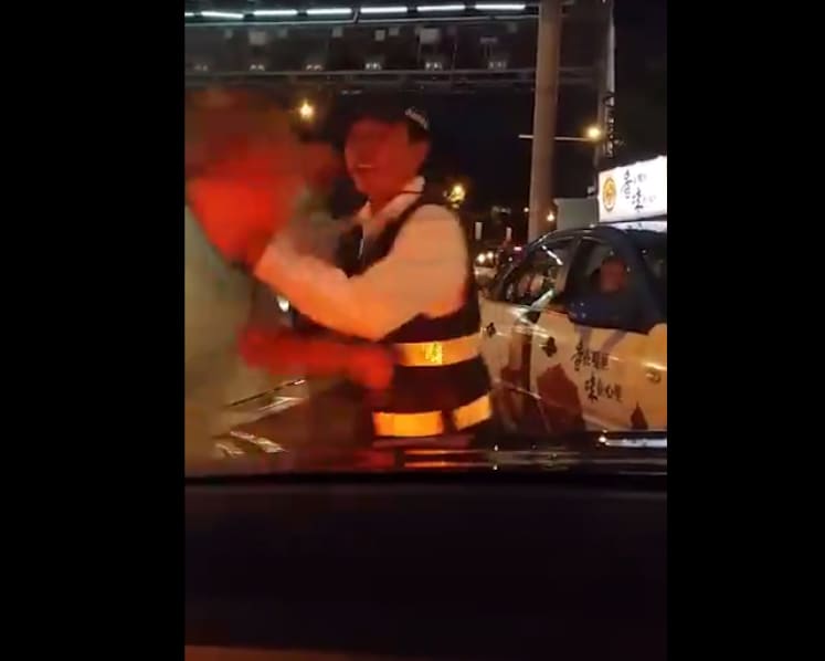 Police arrest suspended LTA officer caught in scuffle with Uber driver