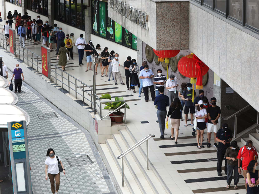 The Toto queue outside Fu Lu Shou Complex at around 1.30pm on Feb 26, 2021.